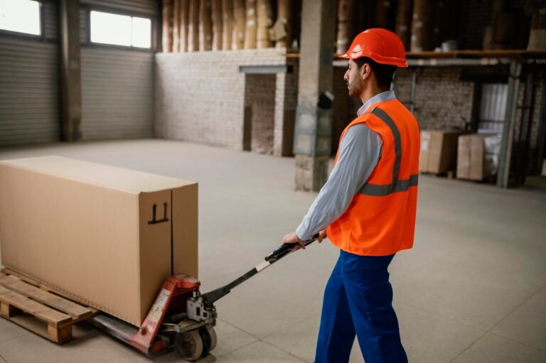 man-working-with-heavy-box